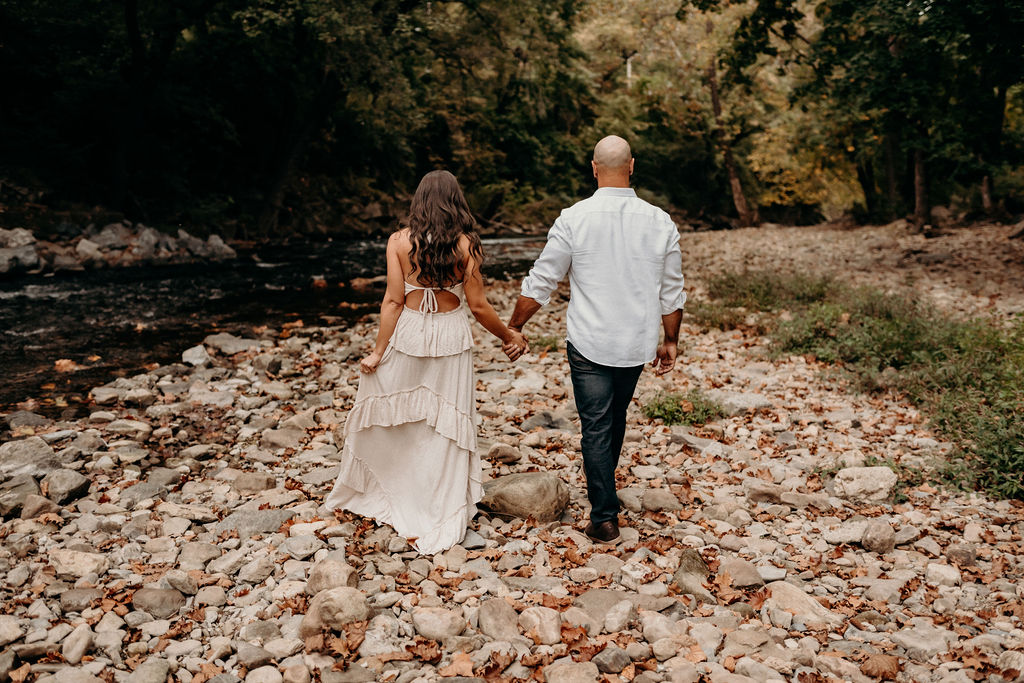 walking shot during engagement photoshoot with their engagement photographer