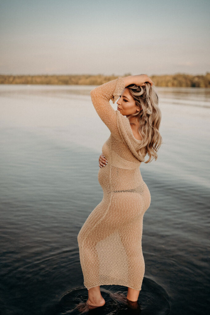 maternity photoshoot standing in water at lake in quakertown, pa
