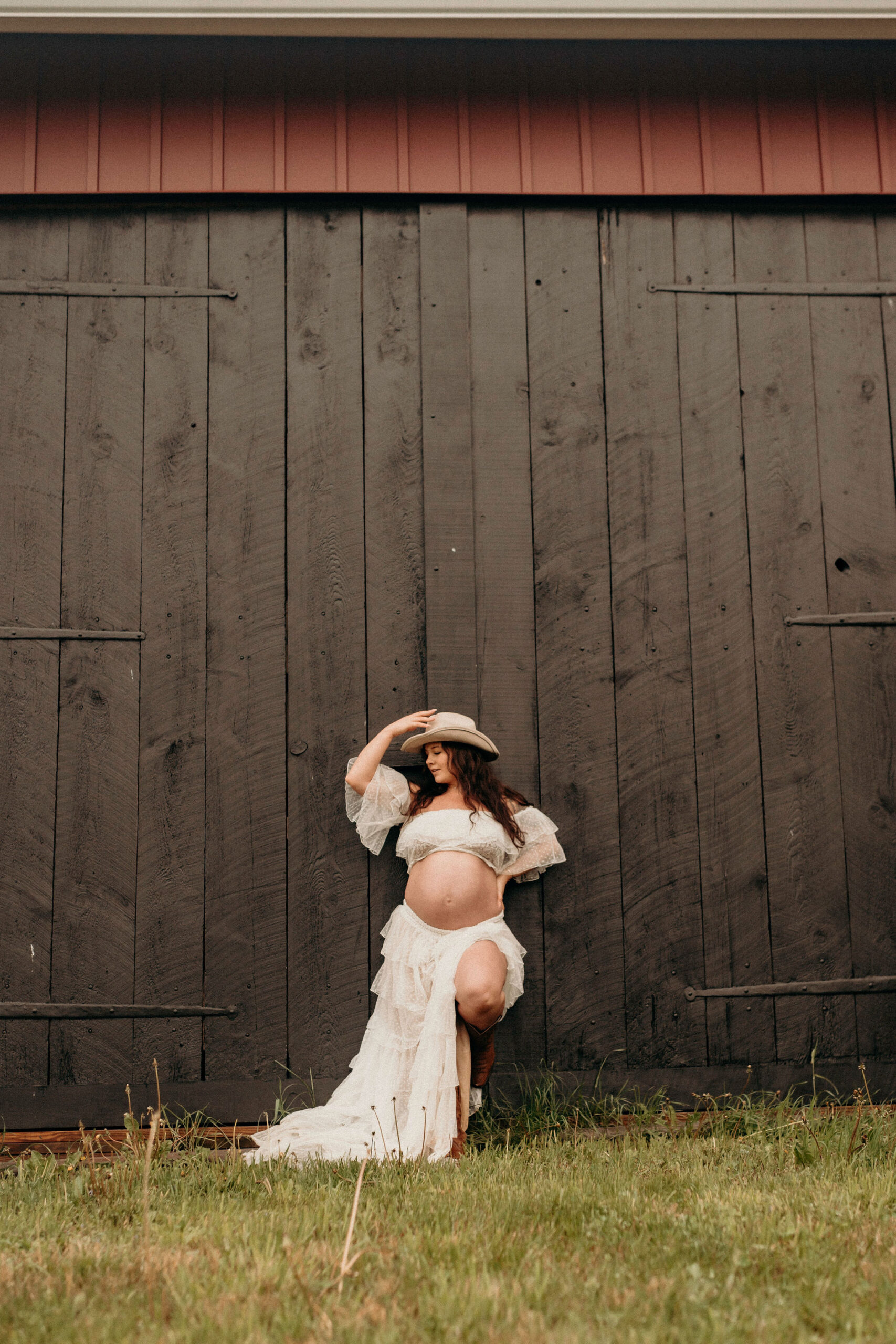 Lehigh Valley motherhood photography -maternity client posing against wall