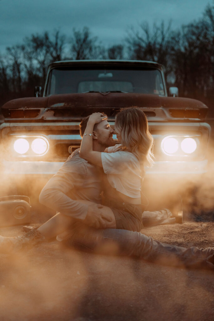 couple photo taken in front of truck in winter