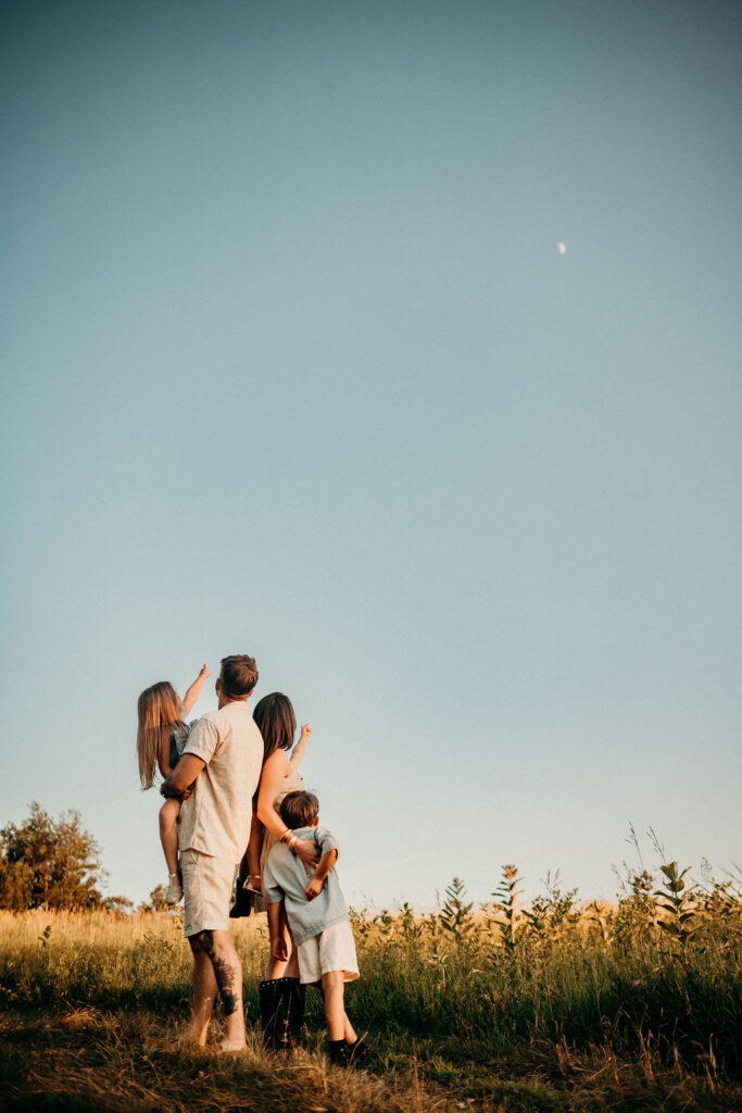 Family photo looking up at moon