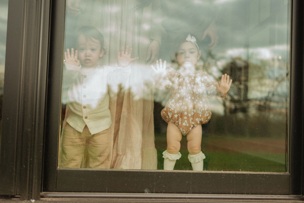 kids looking through window in home in schnecksville PA