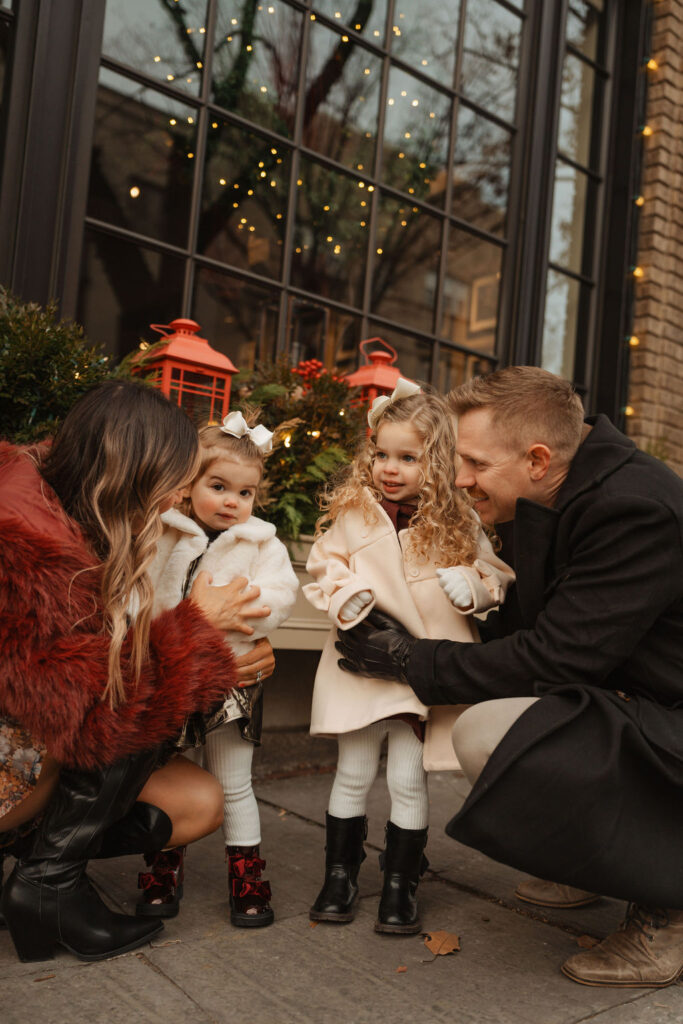 Hotel bethlehem christmas family photos in front of hotel