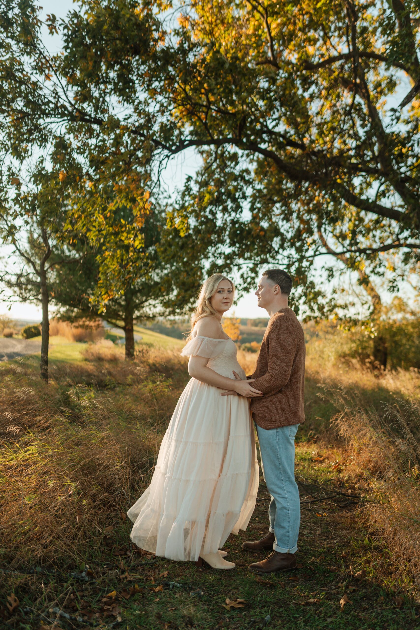 Lehigh valley maternity photo inspiration with couple at sunset golden hour photos in summer